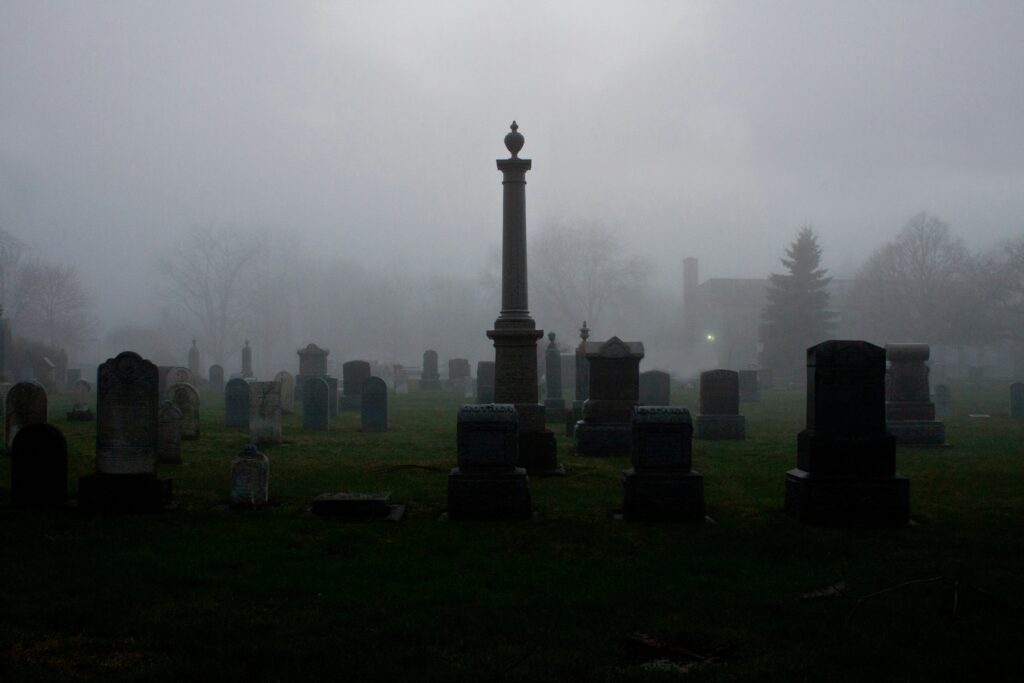 a graveyard with fog to represent how to write a short horror story